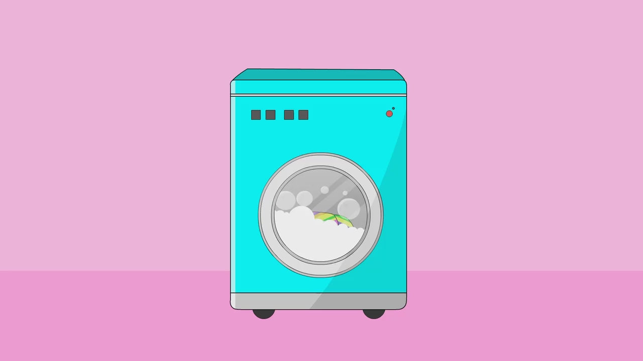 Load video: aqua washing machine washing ruby compression socks on a pink background