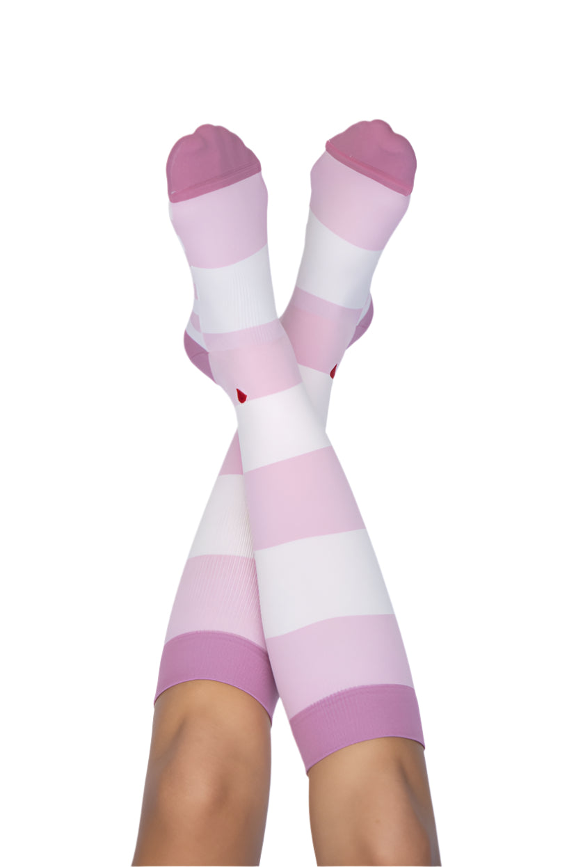 compression socks with blush and mauve stripes with darker blush/mauve accents