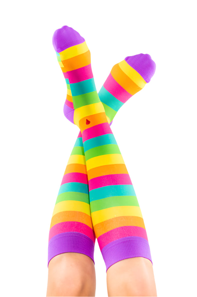 compression socks with rainbow stripes in pink, orange, yellow, green, and teal with purple accents
